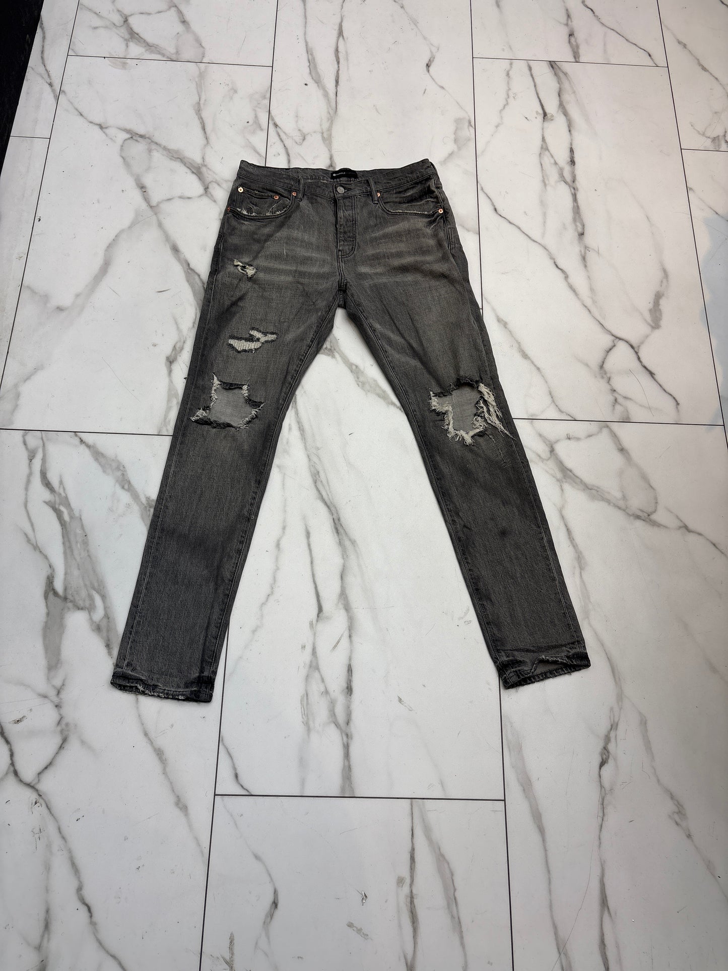 PREOWNED “grey” purple jeans with back tag