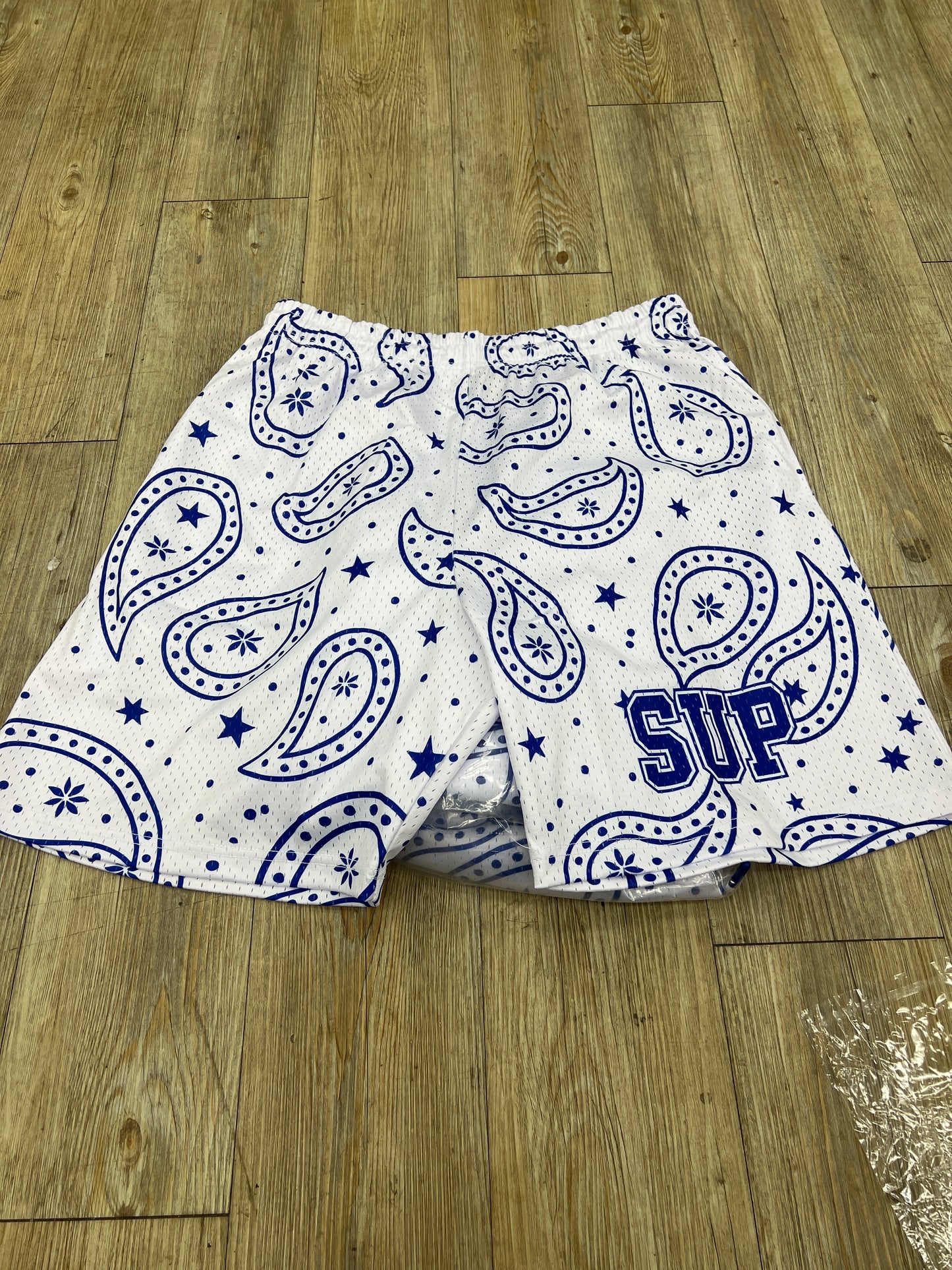 Sup white and blue bandanna