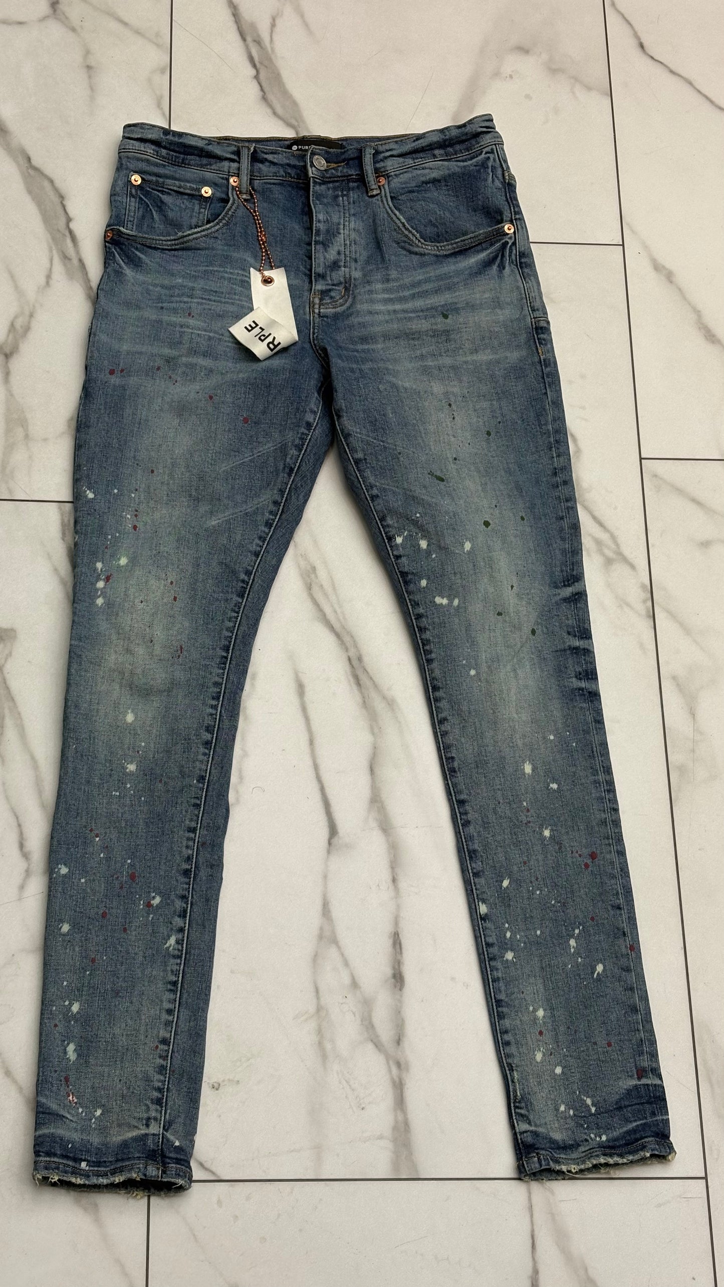 Purple paint splatter jeans PRE-OWNED