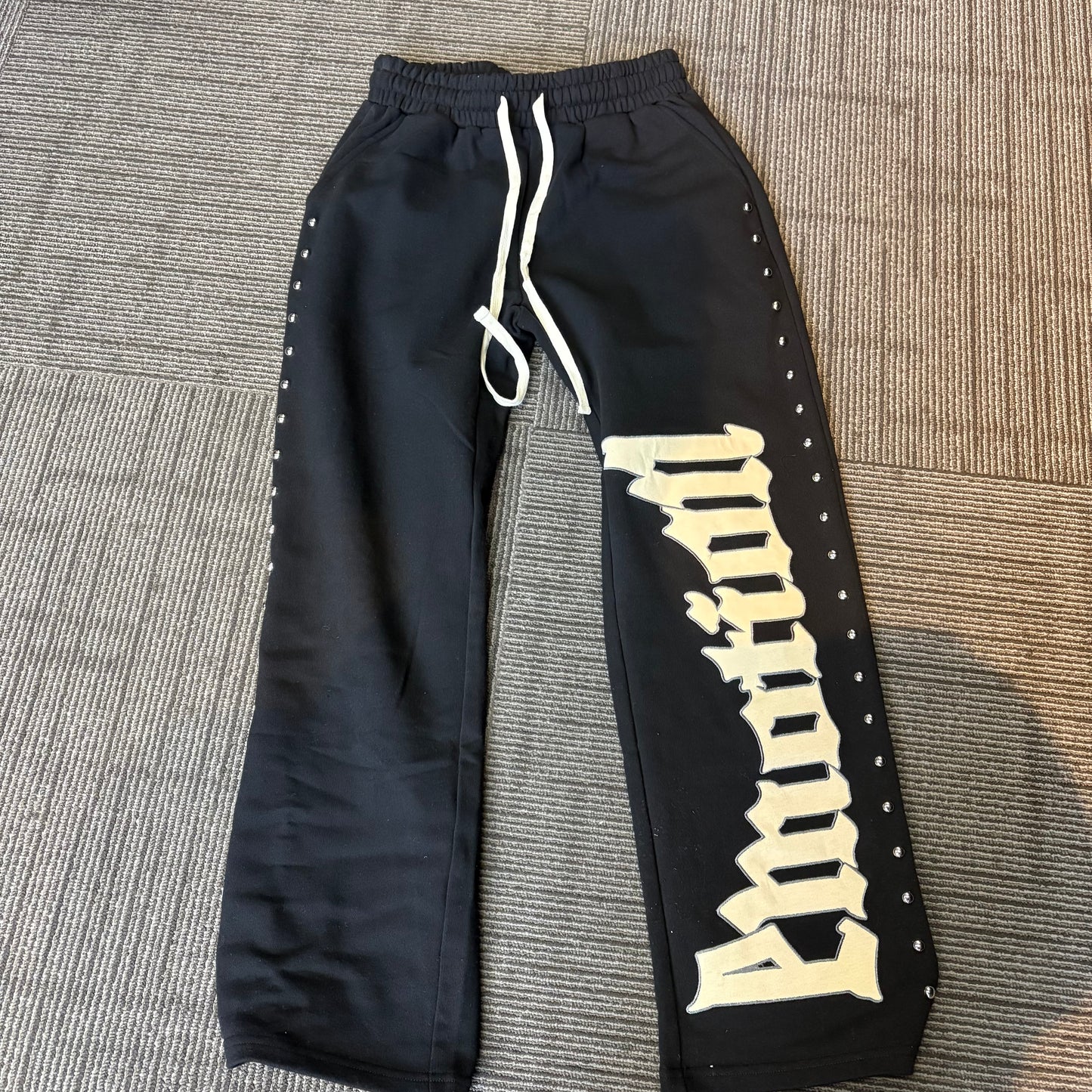 Mixed emotion black sweats