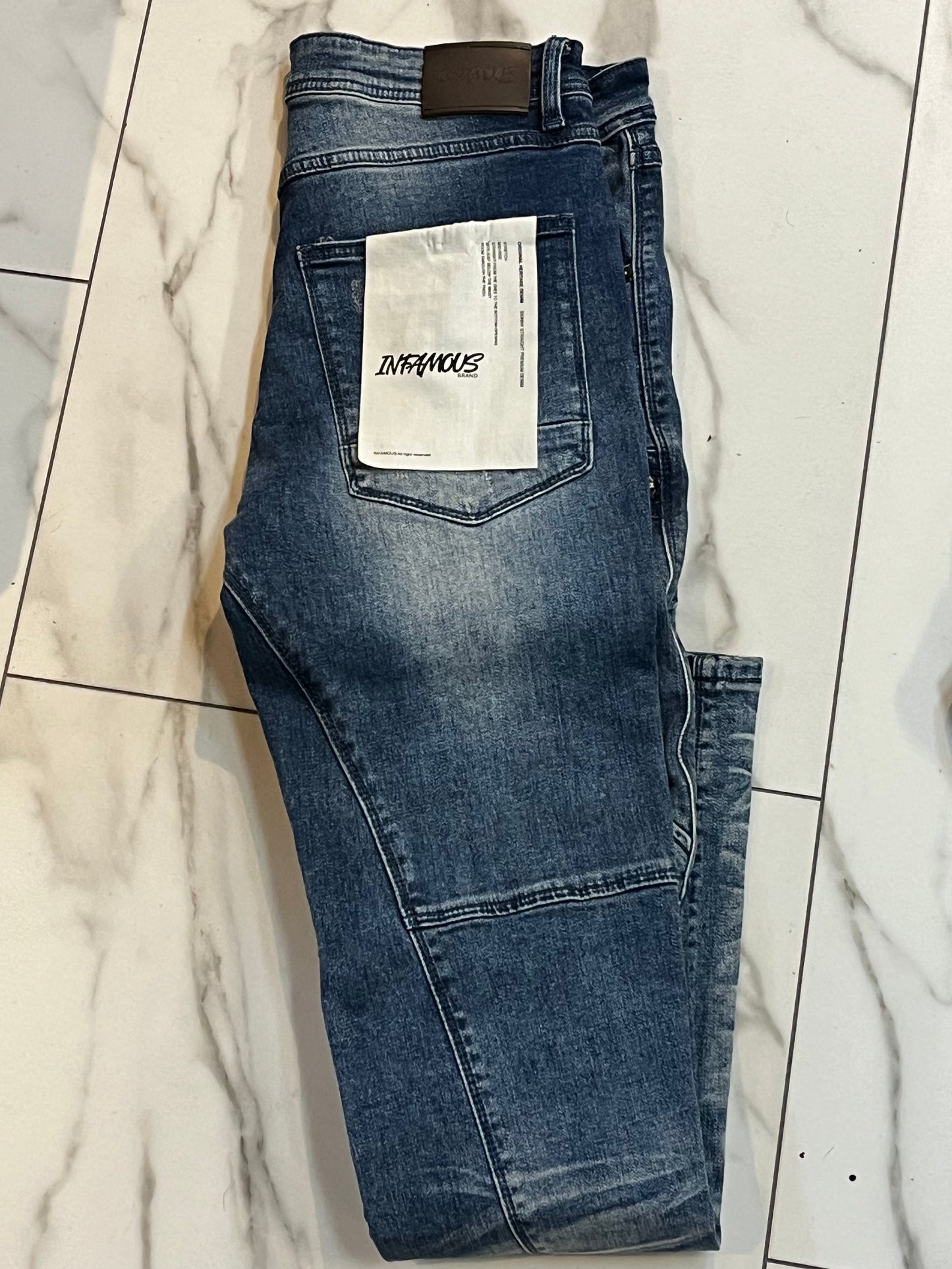 Infamous ripped jeans