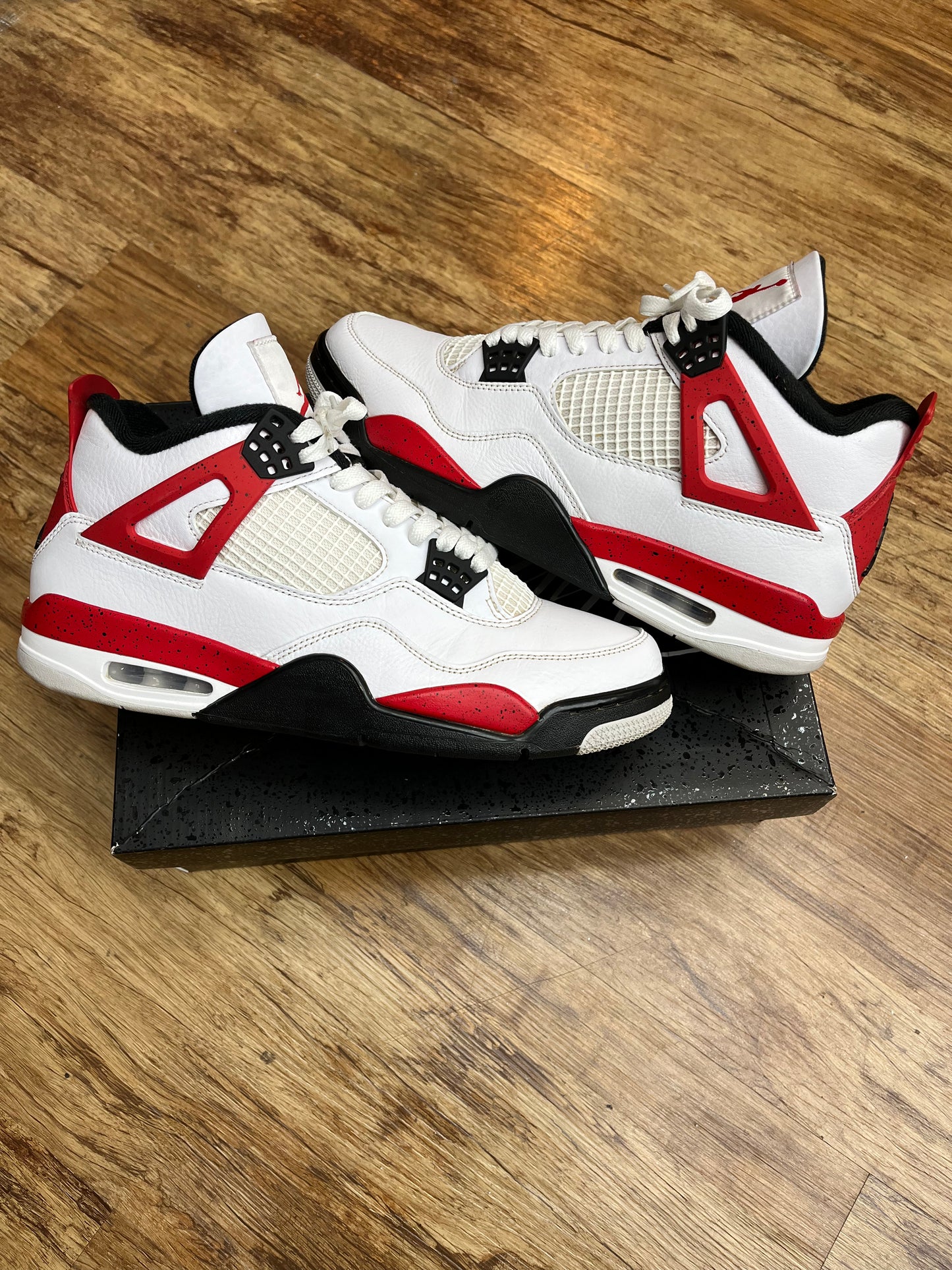 Jordan 4 red cement pre-owned