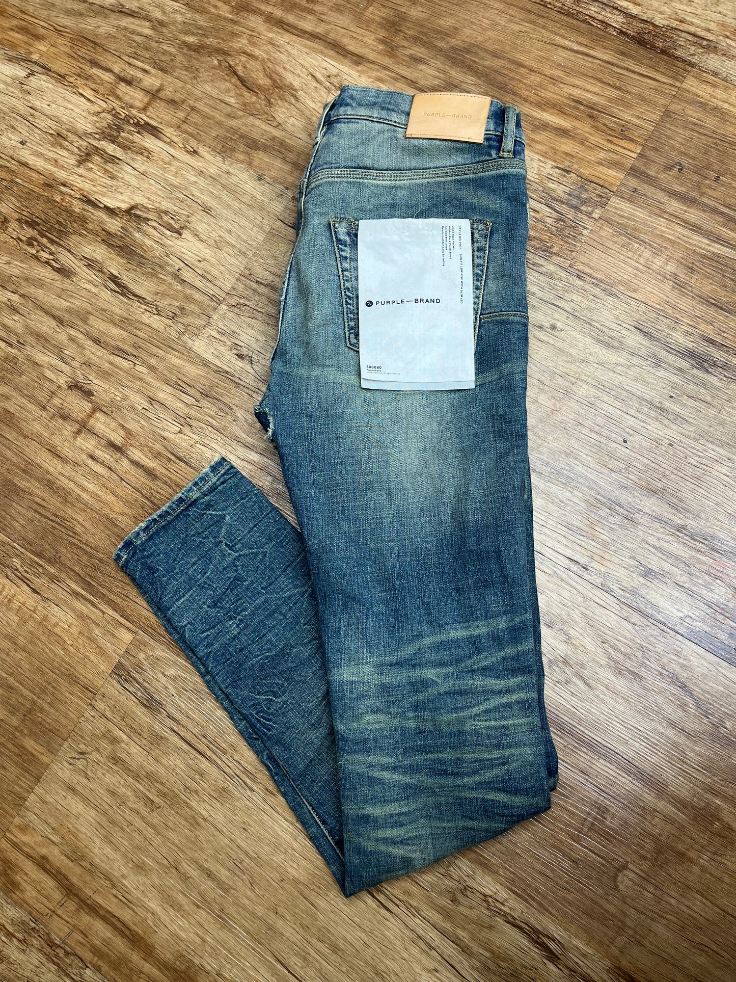 Purple jeans pre-owned