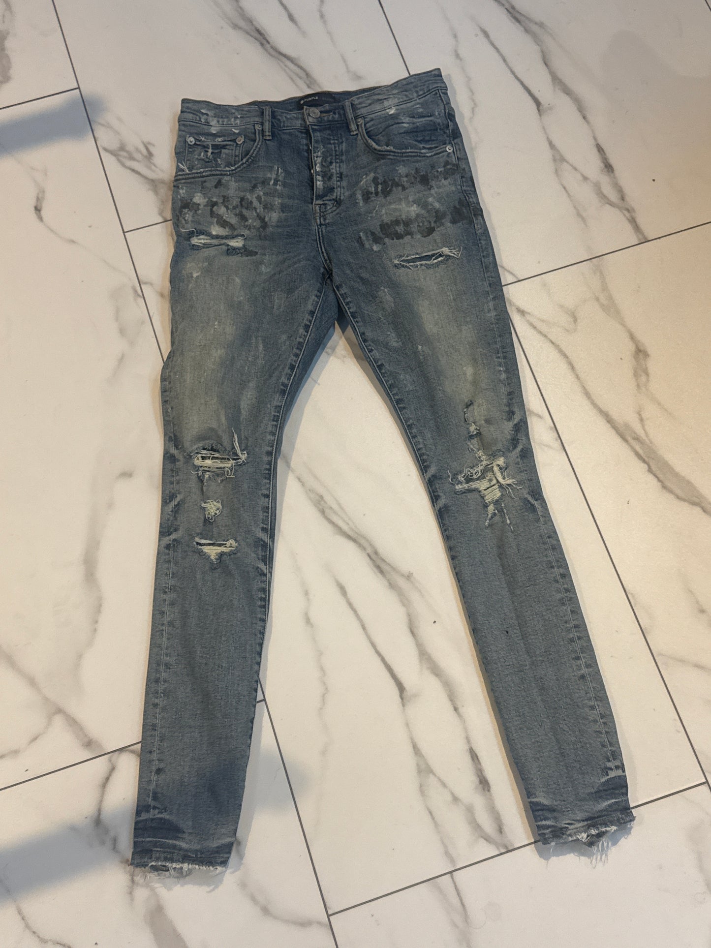 purple jean Blowout w paint w back tag