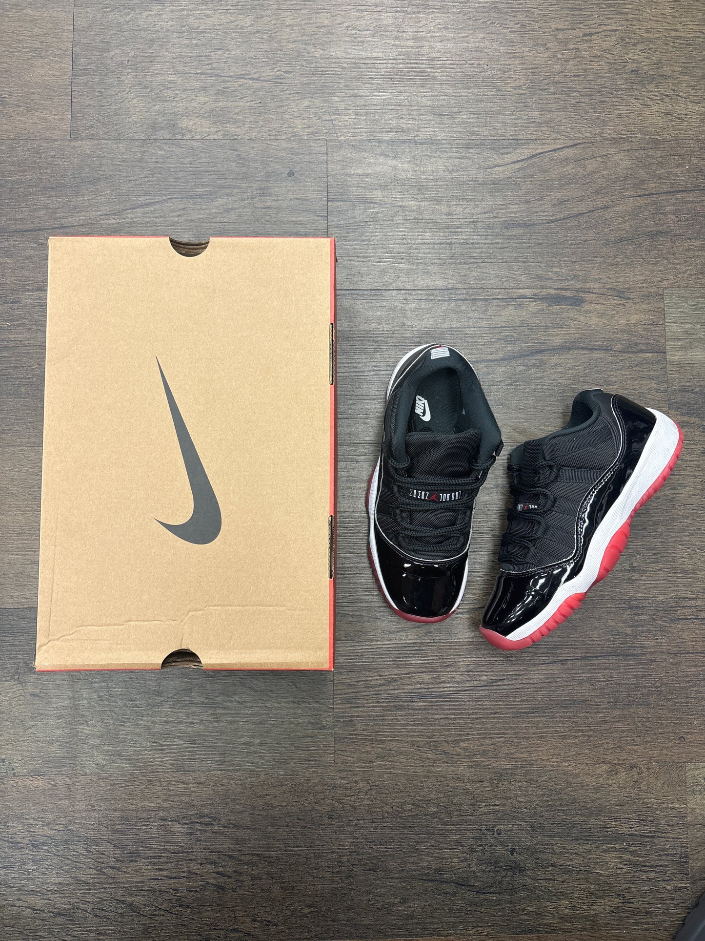 Jordan 11 Low ‘Bred’ PRE-OWNED WITH BOX