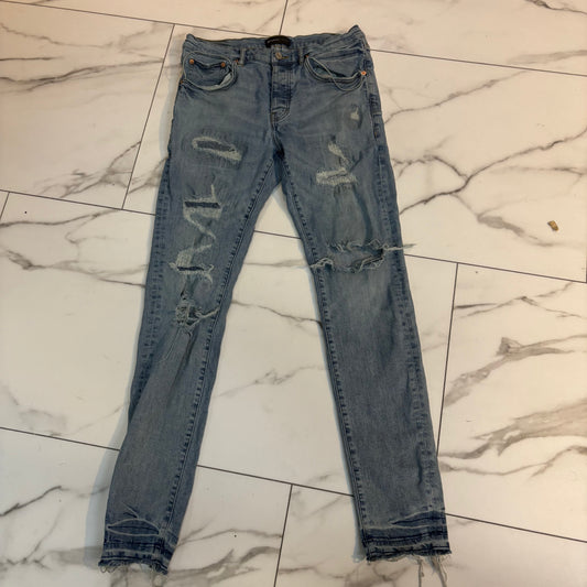 Blue Ripped Purple jeans w Back tag