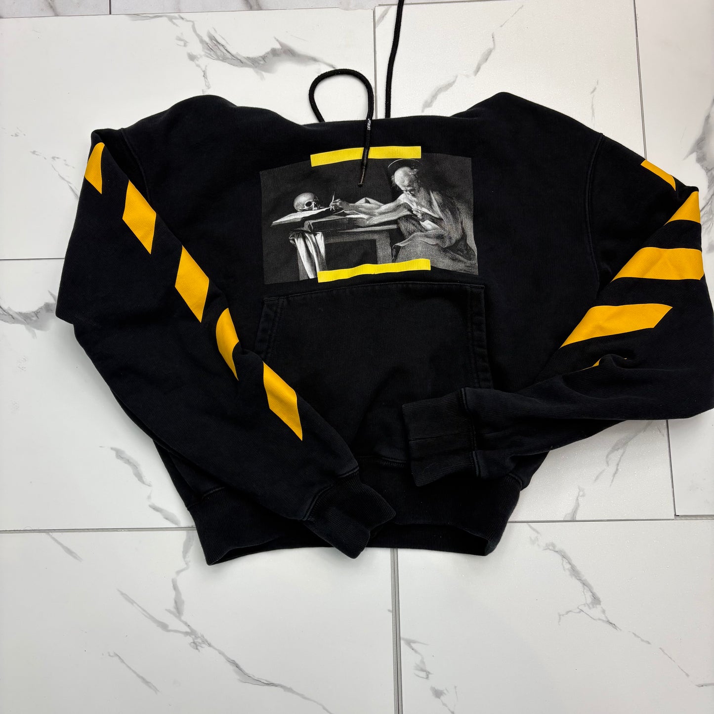 Off-white Caravaggio painting over hoodie