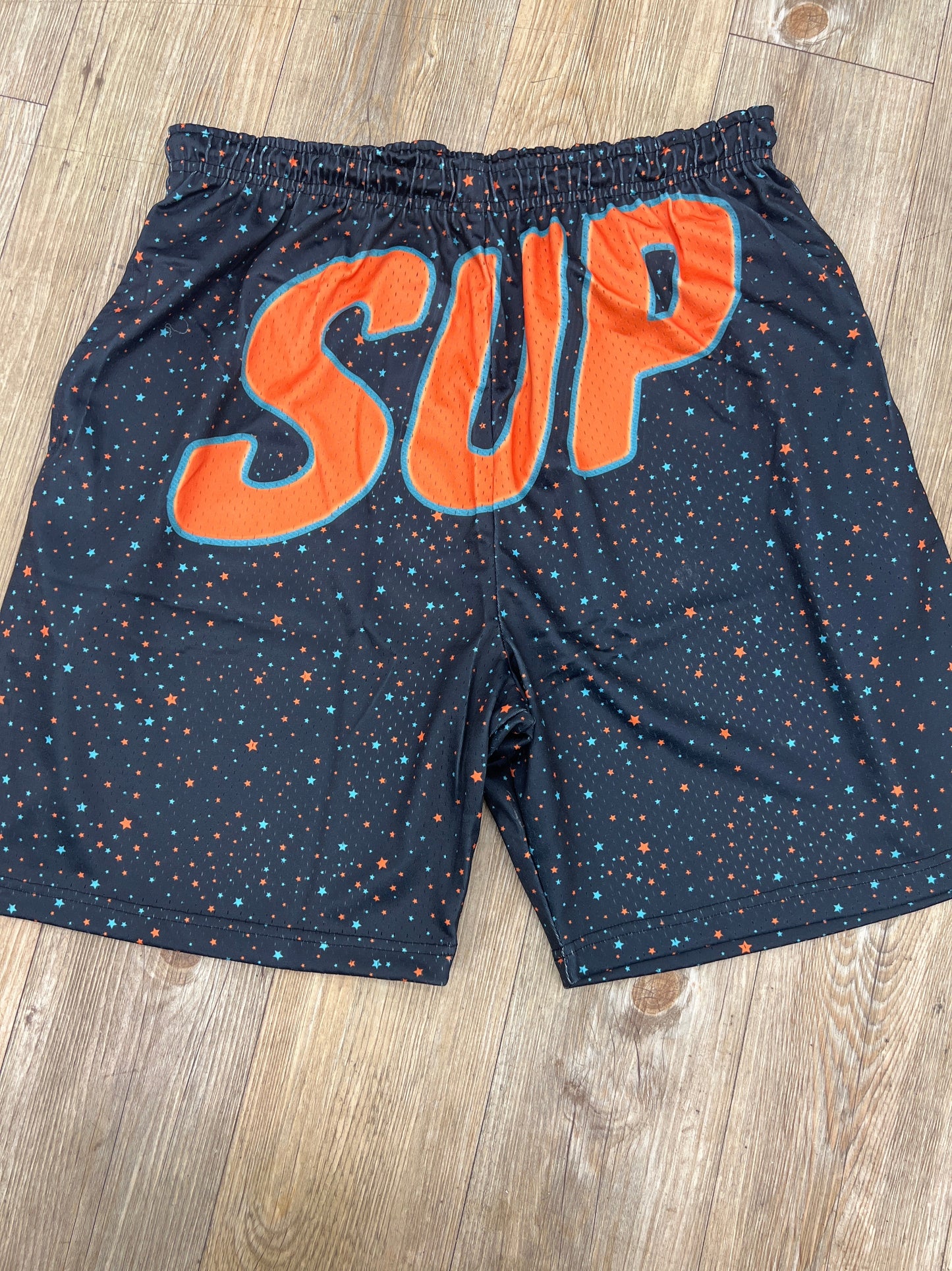 SUP blue and orange stars shorts